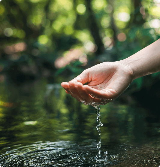Commitment to a better planet hand with water